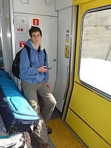 2016-02-29 11.49.39 P1000712 Simon - Adrian in train.jpeg: 3456x4608, 5269k (2016 Feb 29 11:49)