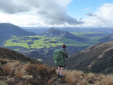 Simon looking down over Pohokura Station
Photographer;&nbsp;Brian
2016-10-29&nbsp;17.05.26;&nbsp;Metadata time: '2016 Oct 29 17:05'
Original size:&nbsp;4,000 x 3,000; 4,725 kB
Filename: 2016-10-29 17.05.26 P1000552 Brian - Simon looking down over Pohokura Station.jpeg