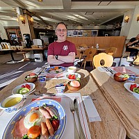 Yamanoeki skiing
Simon at set breakfast when only seven guests
Photographer;&nbsp;Jim
2024-03-11&nbsp;07.35.40;&nbsp;Metadata time: '2024 Mar 11 07:35'
Original size:&nbsp;2,992 x 2,992; 2,746 kB
Filename: 2024-03-11 07.35.40 S21FE+ Jim - Simon at set breakfast when only seven guests.jpeg